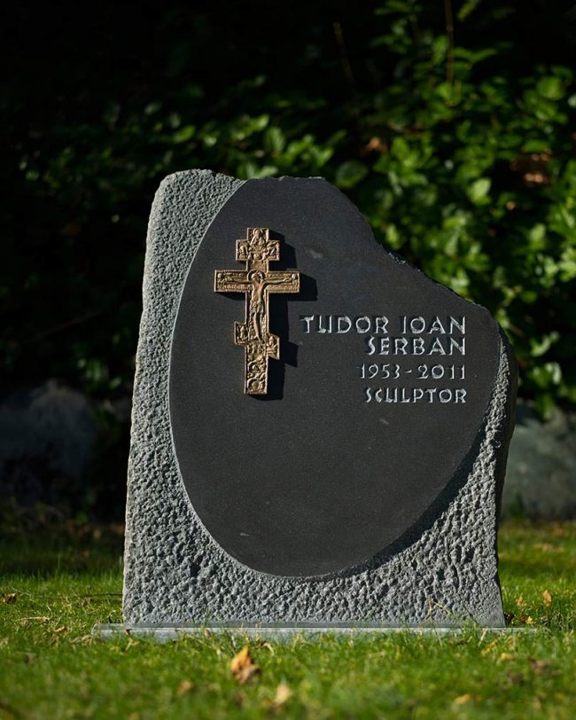 Contemporary British Columbia basalt monument with bronze cross, North Vancouver